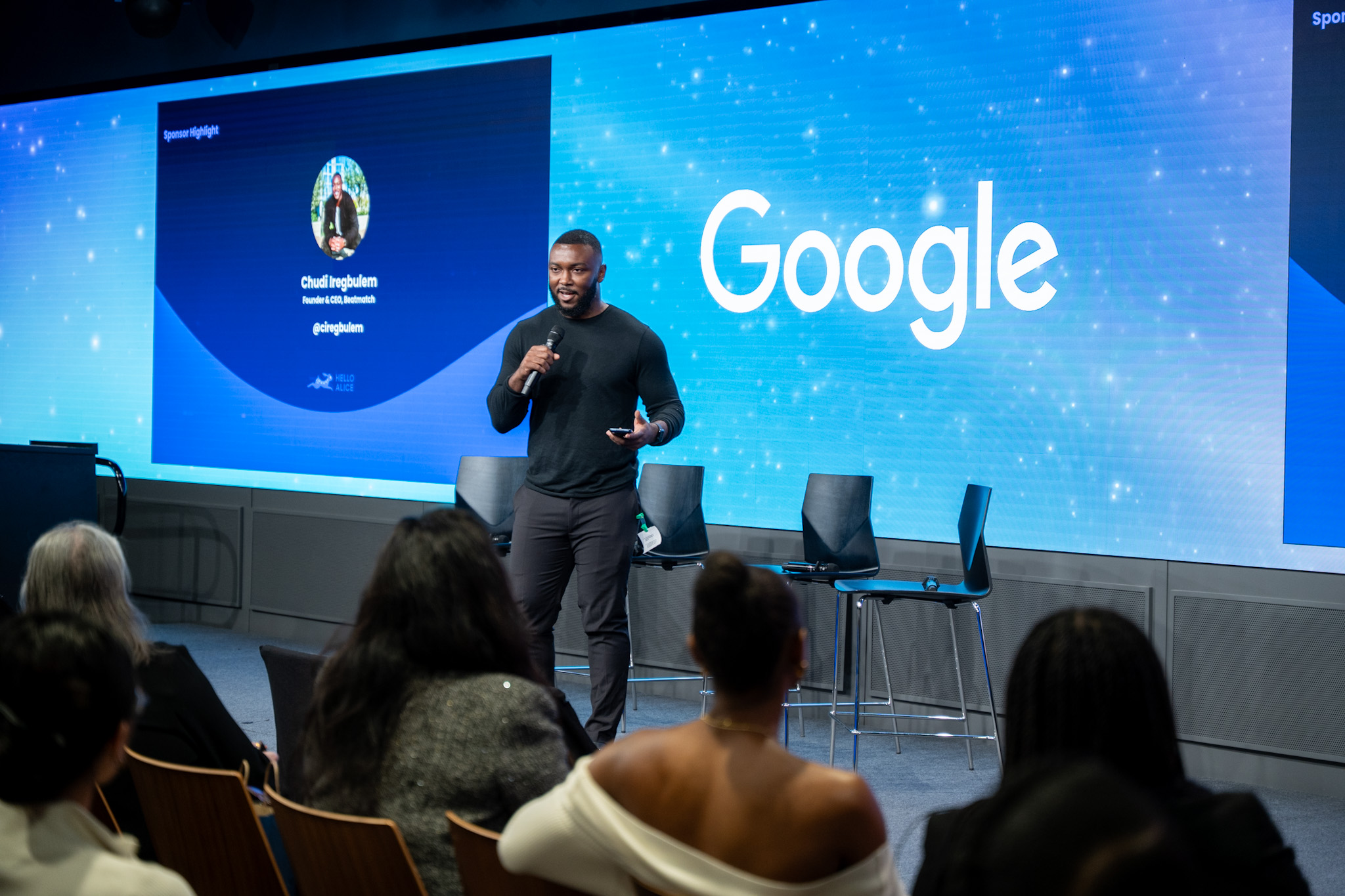 A founder speaking on stage at the LA Main Street Rising Tour stop